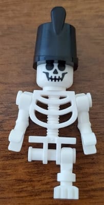 Skeleton - Standard Skull, Bent Arms Horizontal Grip, Black Shako Hat, Single Leg